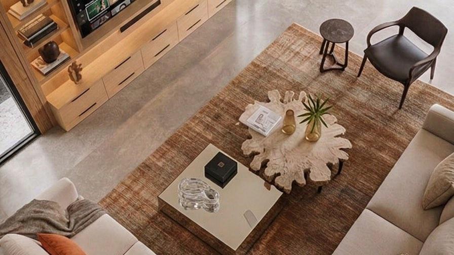 Overhead view of the Bangi living room, its rug, low seating and timber media wall