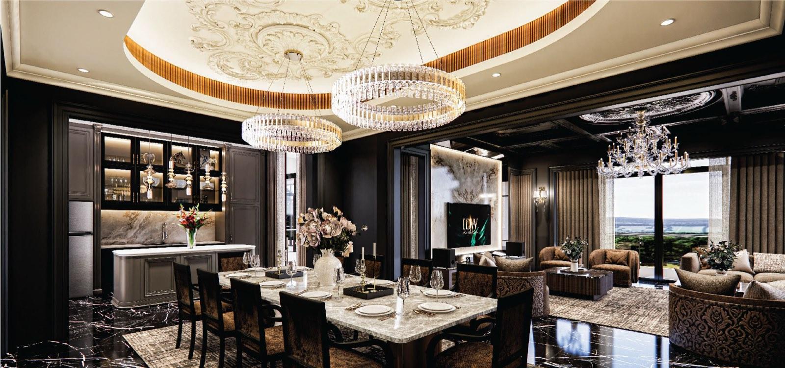 Dining room of the Bukit Gambir residence looking past the lit bar cabinet to the living room and the strait beyond