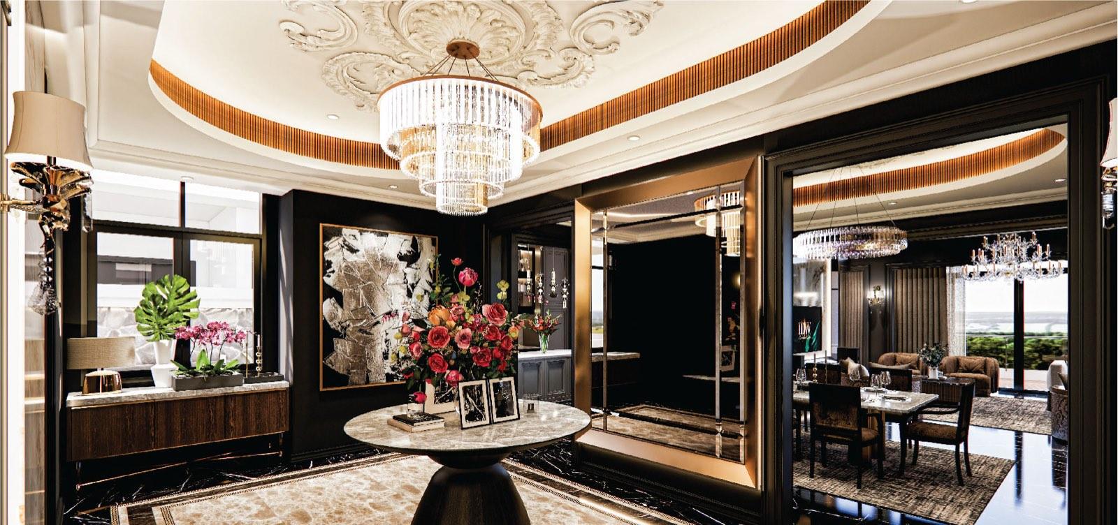 Entrance foyer of the Bukit Gambir residence, a round marble table under an ornate plaster ceiling dome ringed in fluted brass