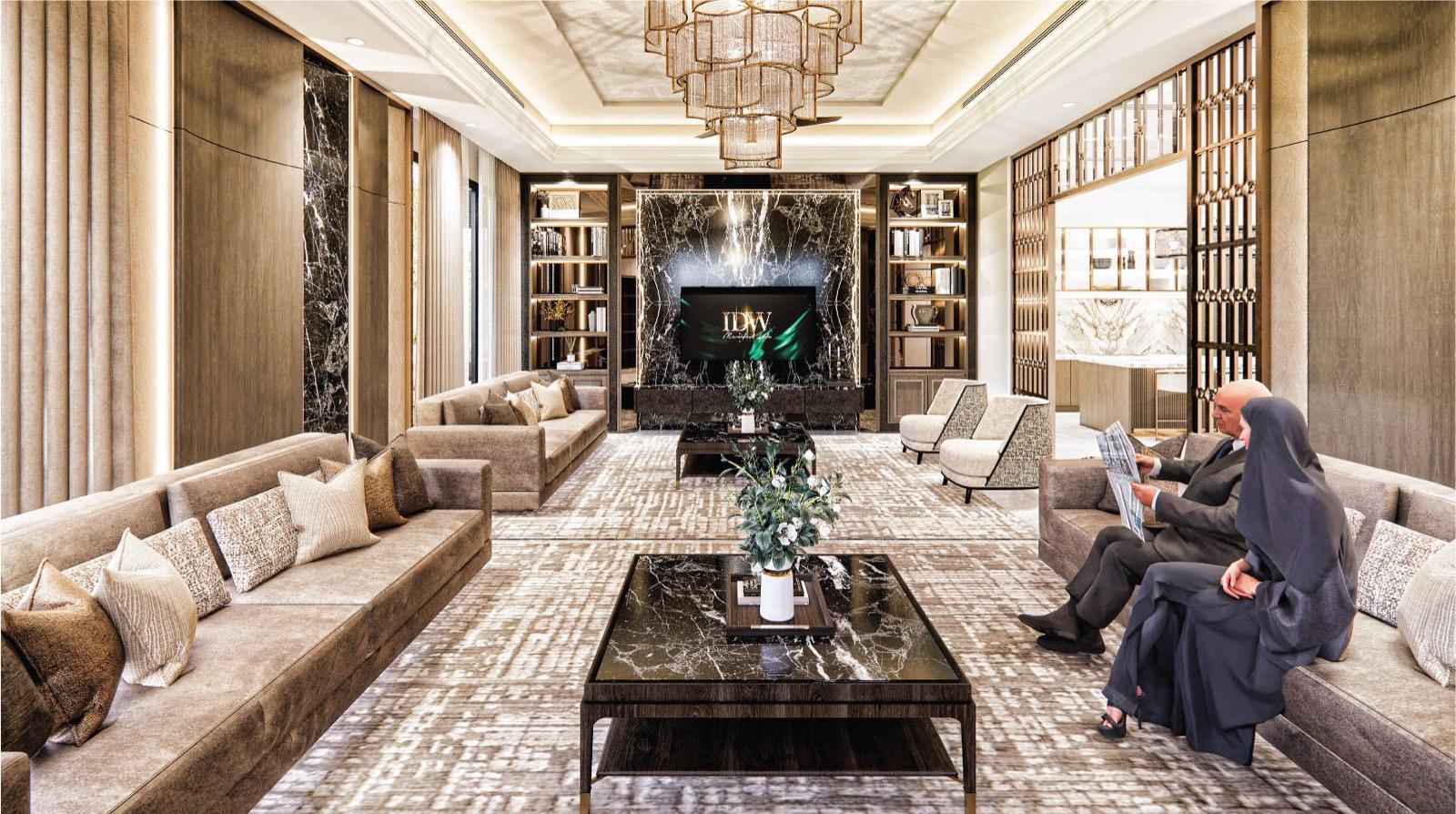 Family living room of the Johor Bahru residence, its black marble media wall flanked by lit bookshelves and bronze fretwork screens