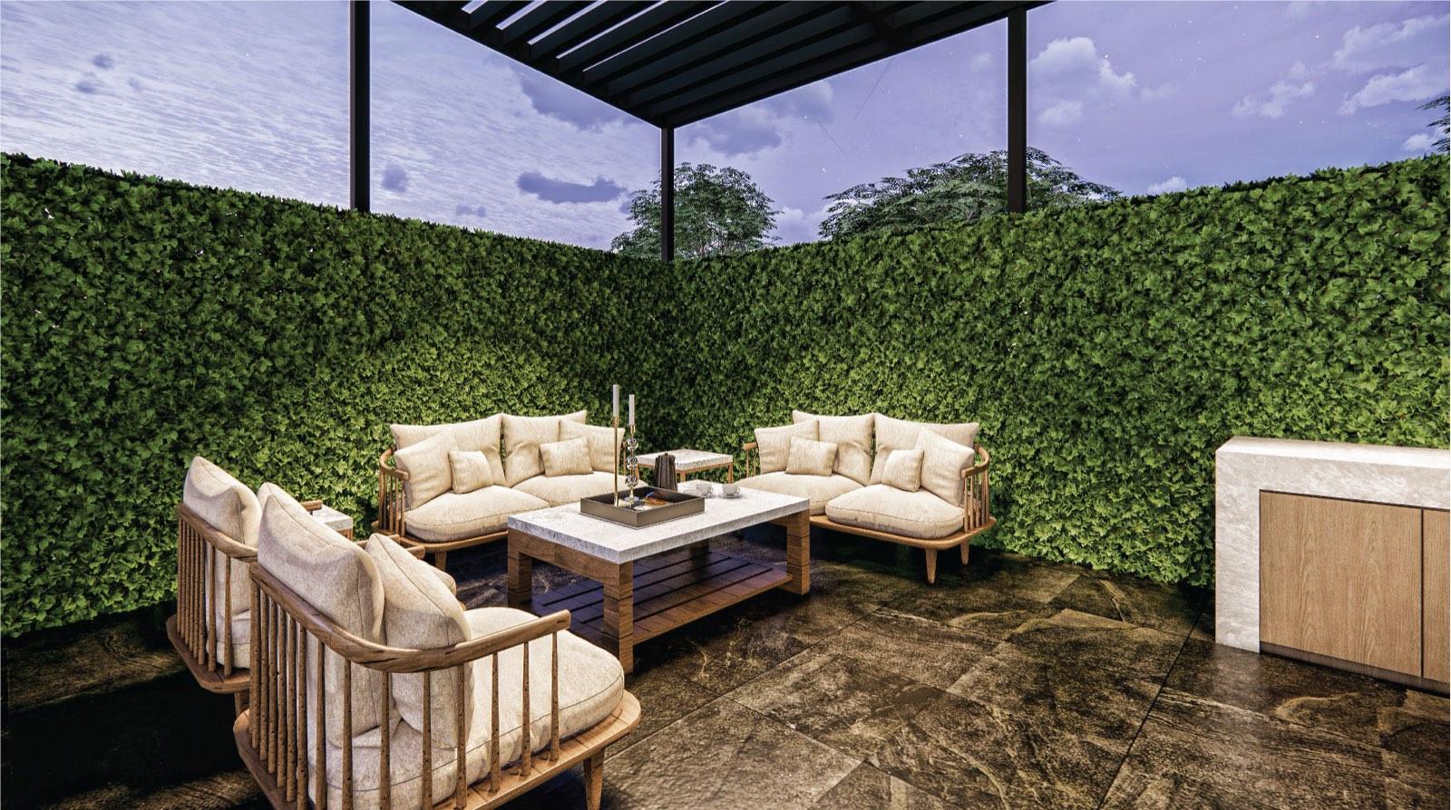 Outdoor lounge under a black pergola at the Johor Bahru residence, hedged in on dark marble paving