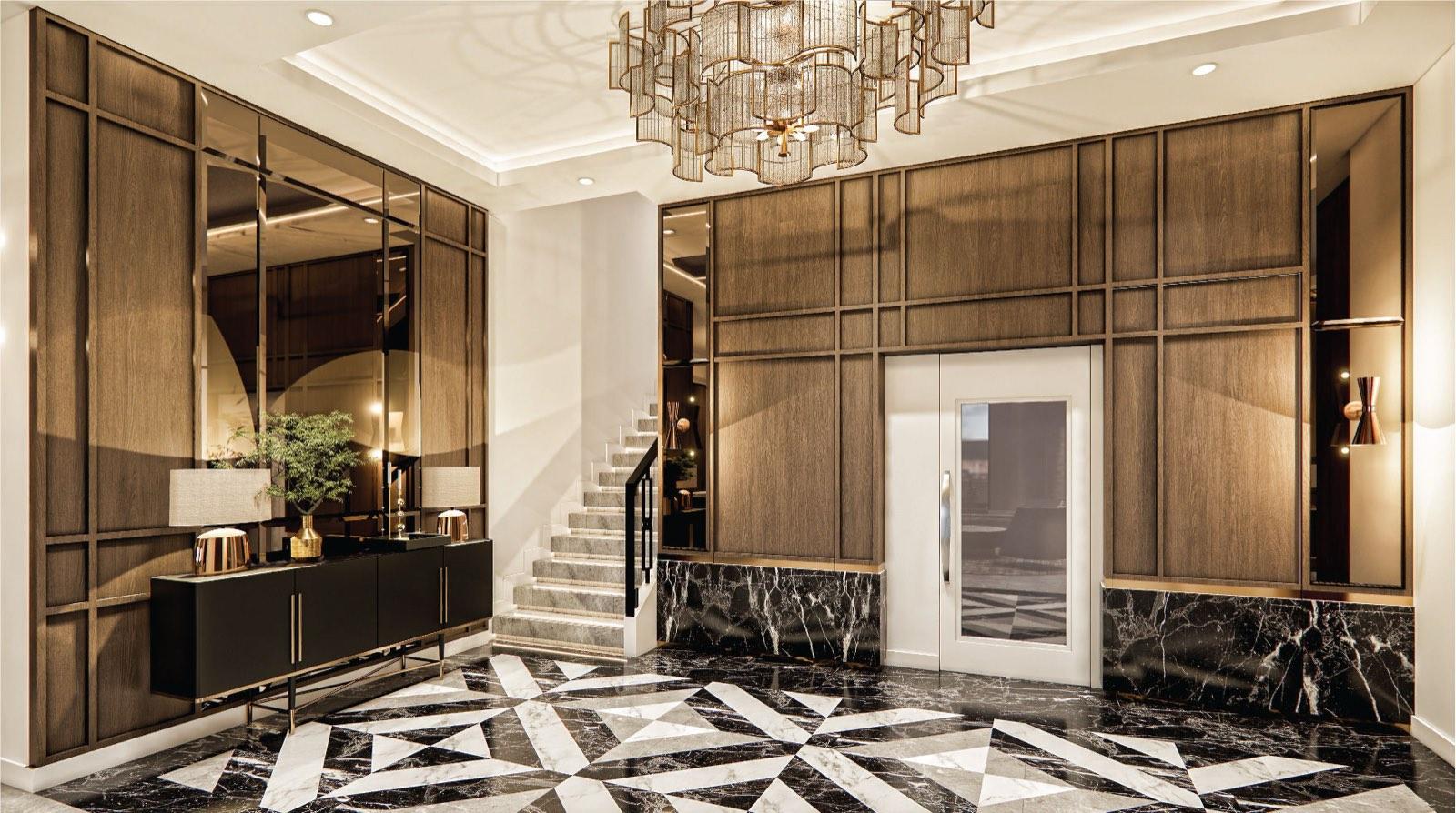 Stair hall of the Johor Bahru residence with walnut panelling, black marble dado and a brass chandelier