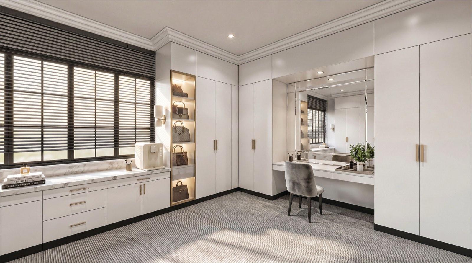 Walk-in wardrobe of the KGSAAS villa in Shah Alam with a lit handbag display column and marble-topped vanity