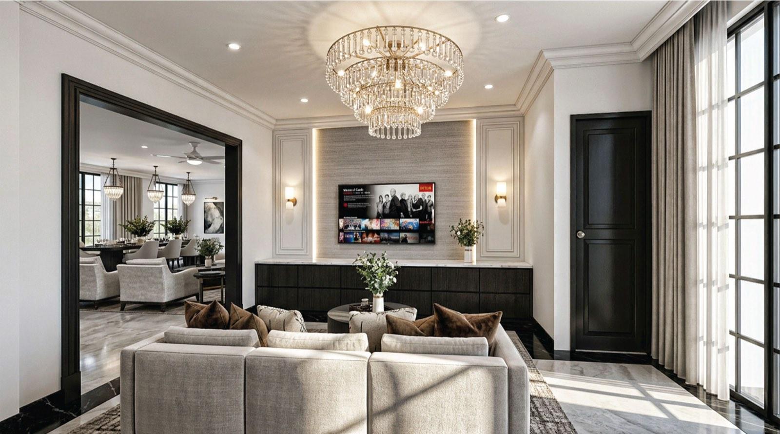 Family lounge of the KGSAAS villa in Shah Alam with a corner sofa, tiered chandelier and television wall