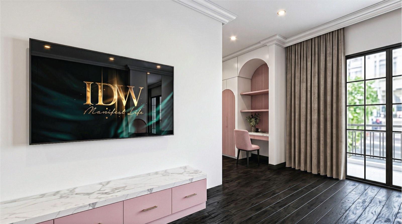 Pink bedroom at the KGSAAS villa in Shah Alam with arched display niches and a fluted desk nook by the balcony