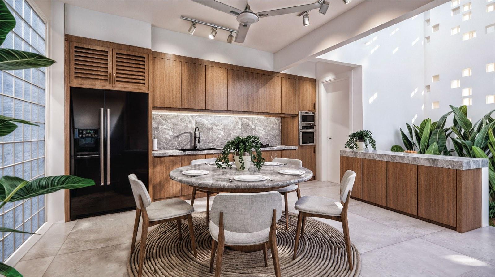 Timber kitchen of the Kuala Lumpur terrace house with a grey marble splashback, round marble table and glass-block wall