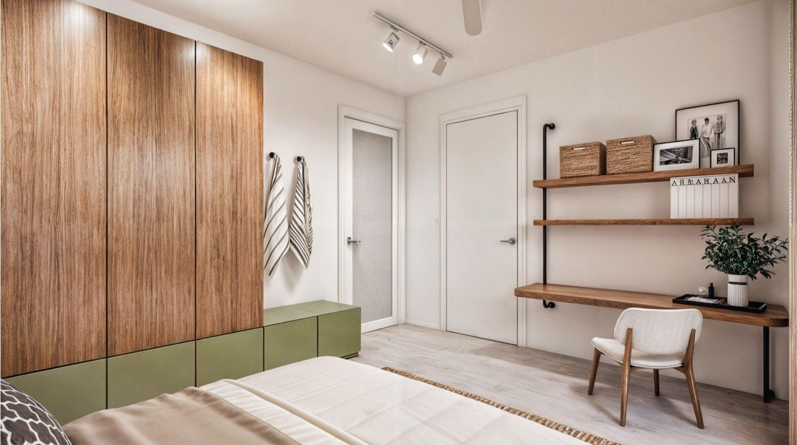 Bedroom of the Kuala Lumpur terrace house with a timber wardrobe wall over olive-green drawers and a built-in desk
