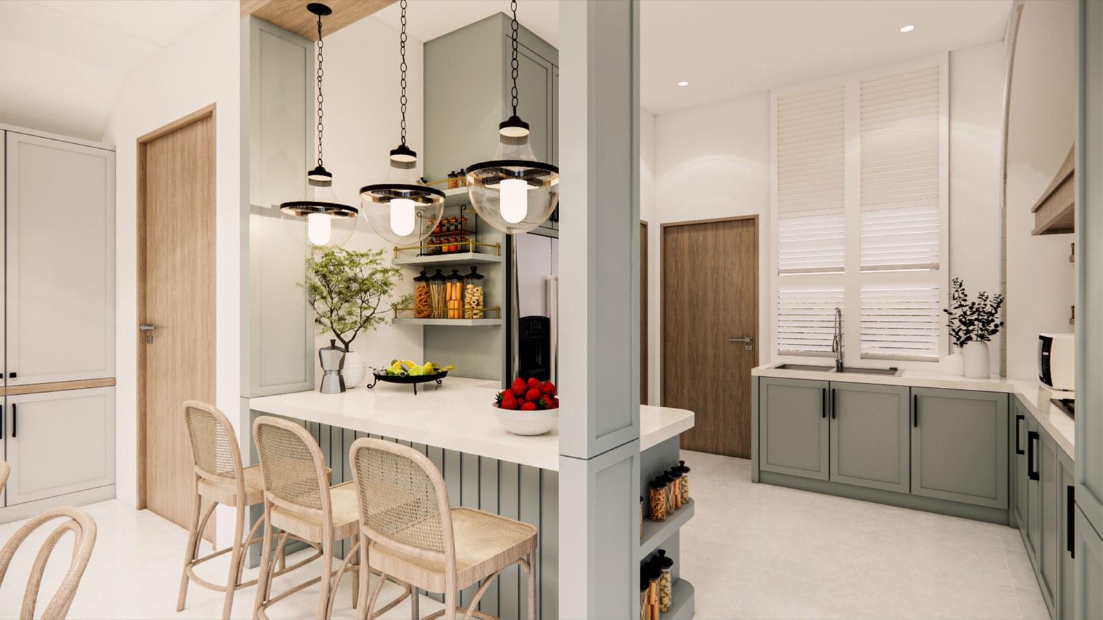 Breakfast counter at the PKNS Kota Puteri show home with rattan bar stools and glass pendants at the edge of the kitchen