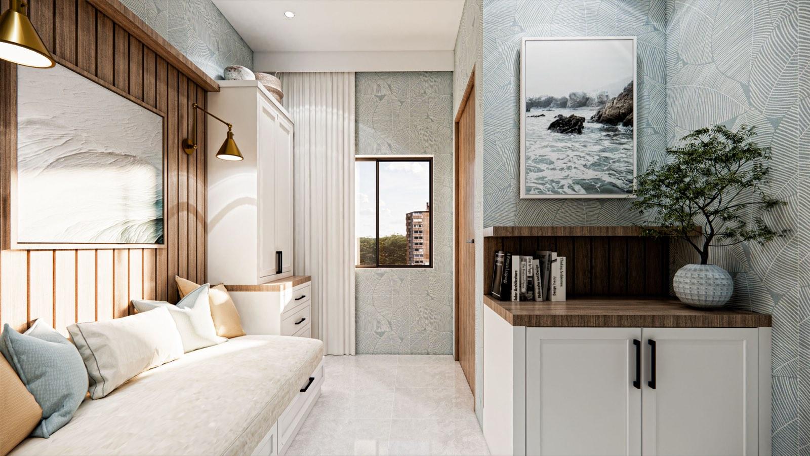 Daybed and white storage cabinetry in the guest bedroom of the PKNS Kota Puteri show home, with coastal prints and leaf wallpaper