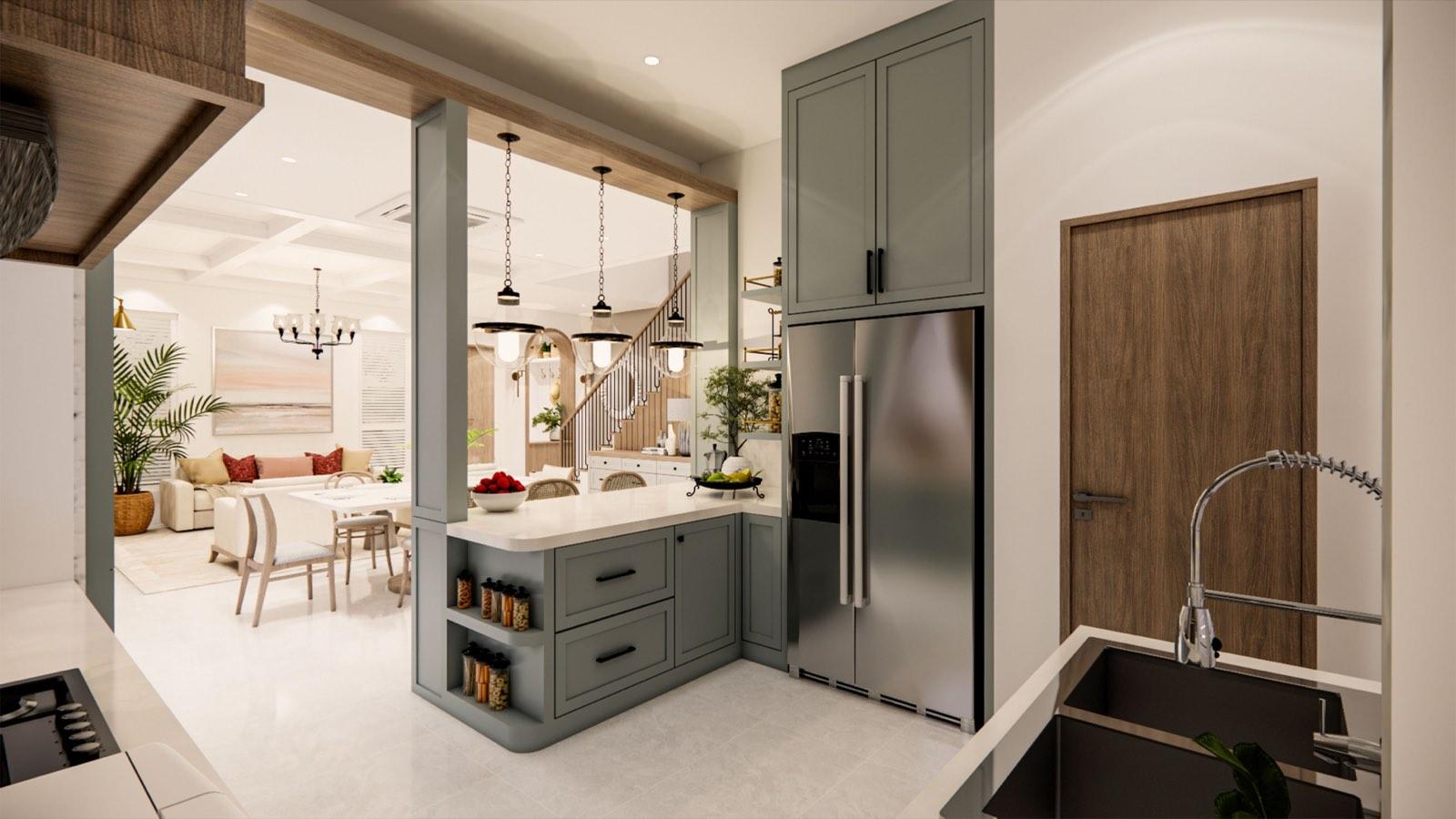 Sage-green pantry cabinetry and fridge at the PKNS Kota Puteri show home, looking back through to the dining and living areas