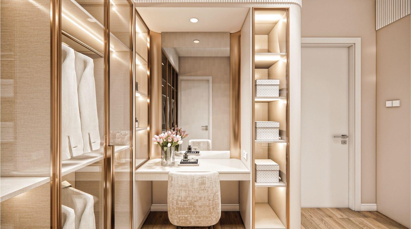 Lit vanity table in the walk-in wardrobe at Monarc, Gamuda Gardens, flanked by glazed hanging bays and display shelving