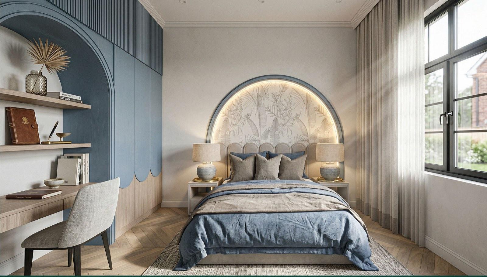Powder-blue bedroom in the Taman Paroi Jaya house with a lit arched mural above the headboard and scalloped joinery