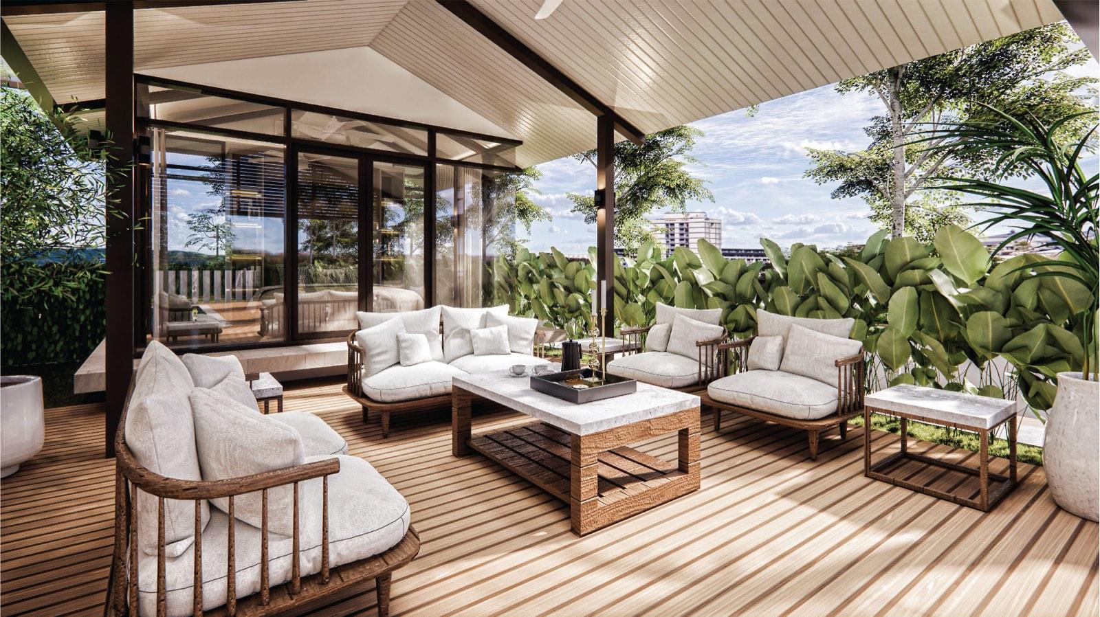 Outdoor lounge on the timber pavilion deck at the Putrajaya villa, ringed by banana-leaf planting
