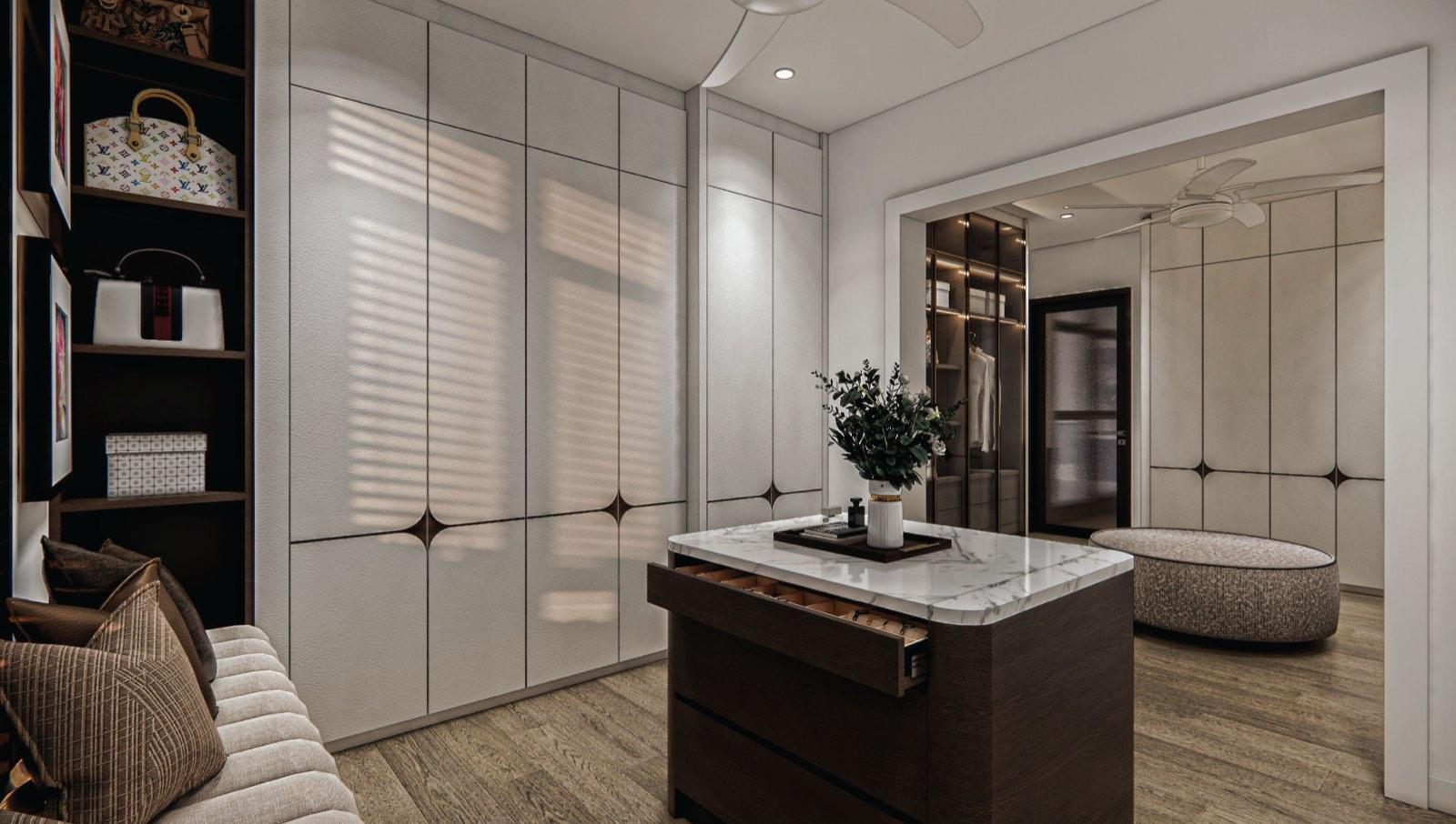 Wardrobe room at the Putrajaya villa with a marble-topped island and leather-fronted doors