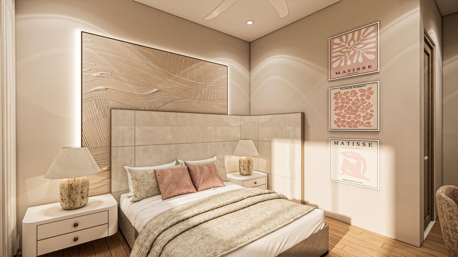 Bedroom of the PKNS SCV Phase 2 show unit with a textured plaster panel above the wide upholstered headboard and blush artwork