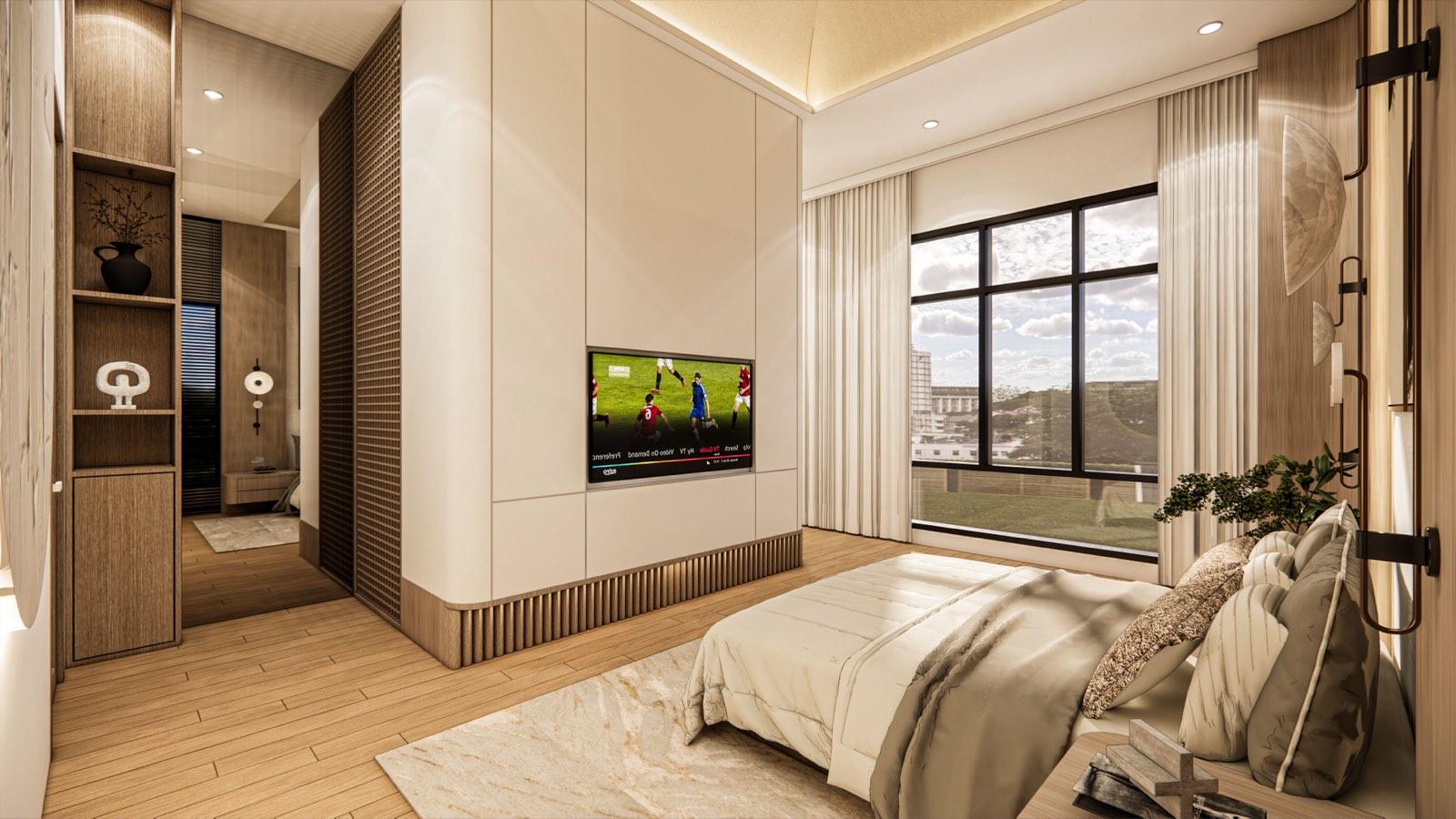Master bedroom of the PKNS SCV Phase 2 show unit with a TV set into the cream wardrobe volume and full-height windows beyond