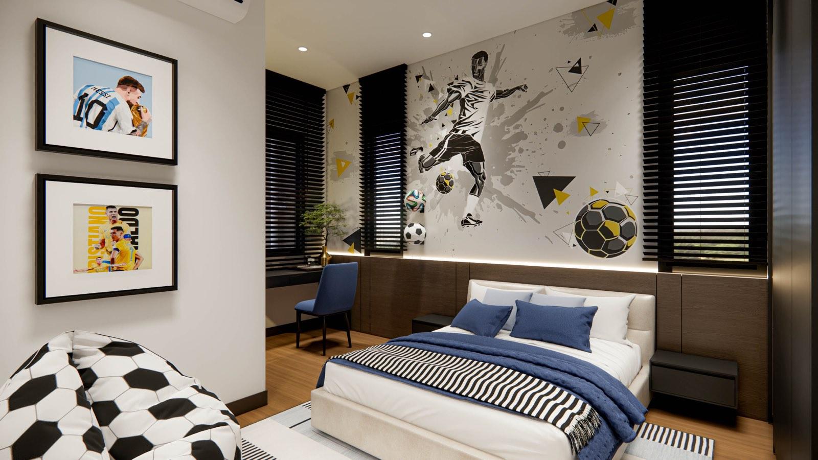 Football-themed children’s bedroom in the Sime Darby Modern Grandeur show home with a player mural and navy bedding
