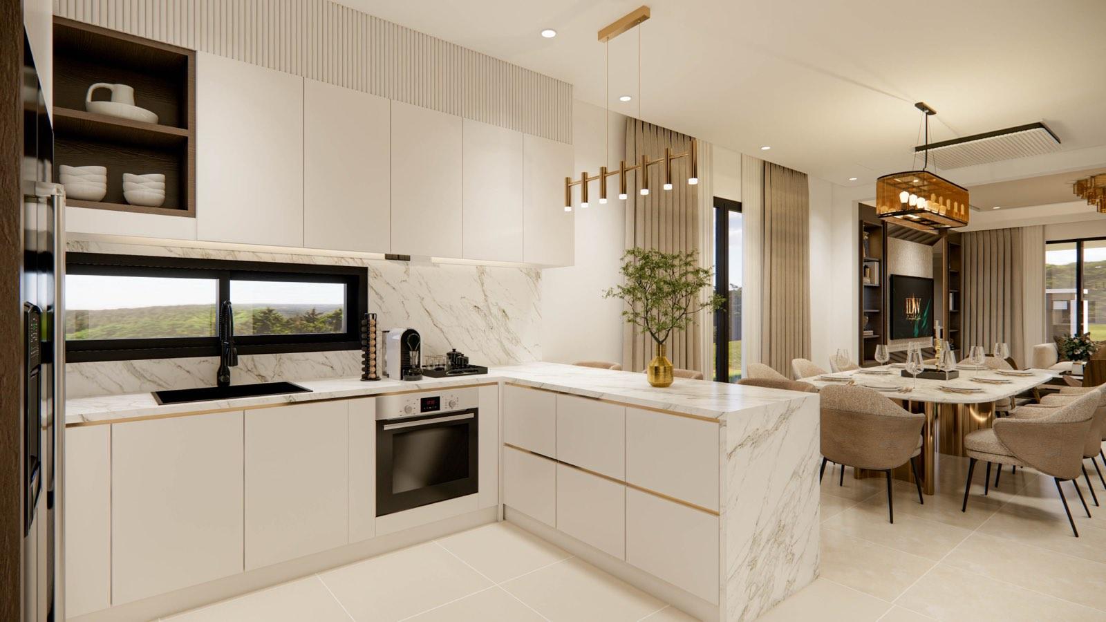 Kitchen of the Sime Darby Modern Grandeur show home looking across the marble worktop to the dining table