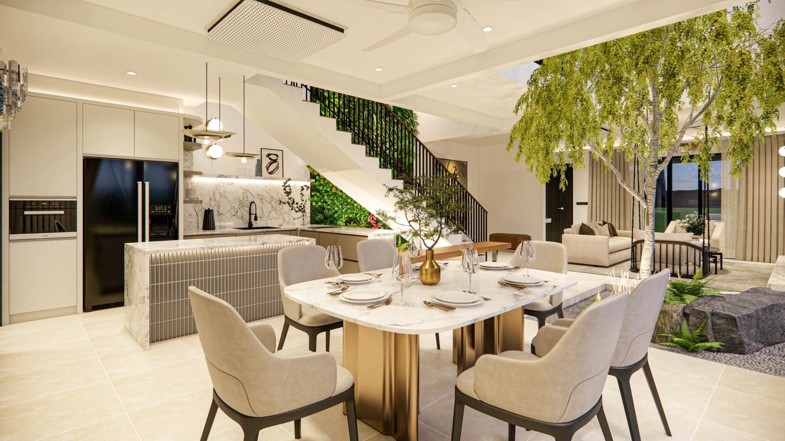 Marble dining table on a bronze base at the Sime Darby show unit, with the dry kitchen and courtyard tree on either side