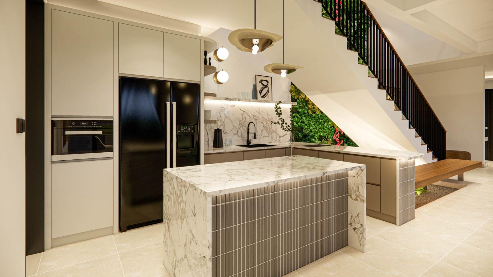 Fluted-tile marble-topped island tucked under the stair at the Sime Darby show unit, beside a lit vertical garden