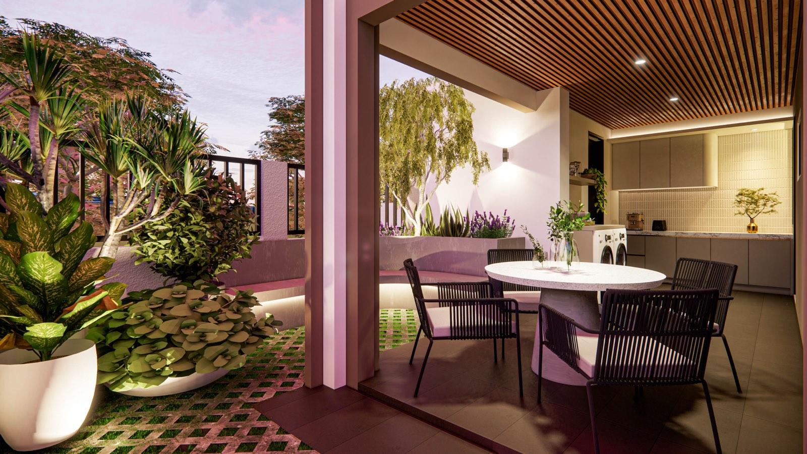 Timber-ceilinged terrace at the Sime Darby show unit with a round terrazzo table, planted beds and the laundry beyond