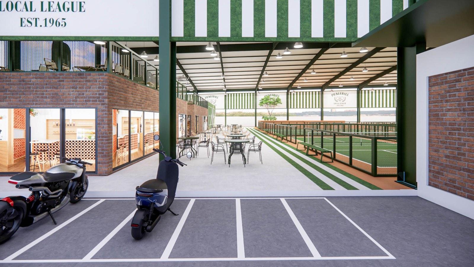 Arrival colonnade at PKNS Signature with brick shopfronts and courts beyond